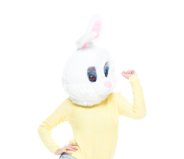 One person / waist up of 18-19 years old beautiful redhead caucasian young women teenage girls dancing / exercising in front of white background wearing jeans / mask - disguise / costume who is humor / cheerful who is sweating / wearing a rabbit mask una persona / cintura para arriba de 18-19 años de edad hermosa pelirroja caucasian jóvenes chicas adolescentes bailando / haciendo ejercicio frente al fondo blanco usando jeans / máscara - disfraz / traje que es humor / alegre que está sudando / usand
