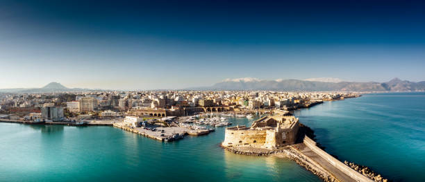 Heraklion port, Crete Greece summer Old port and residential district with Koules fortress, Heraklion, Greece herakleion photos stock pictures, royalty-free photos & images