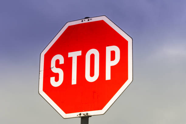 istock Stop sign with sky in the background 1176840227