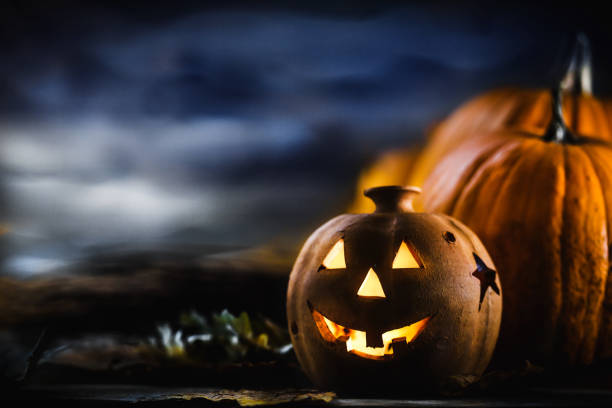 istock Jack o Lantern - autumn Halloween holiday concept background 1176842637