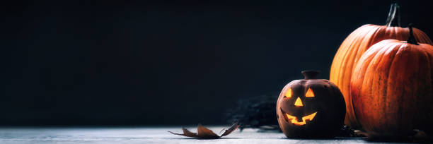 istock Jack o Lantern - autumn Halloween holiday concept background 1176844042