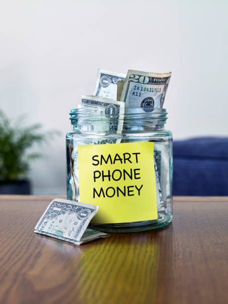 istock Saving money for smart phone 1176844517
