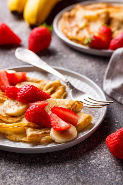 istock Crepes with strawberry and banana 1176845516
