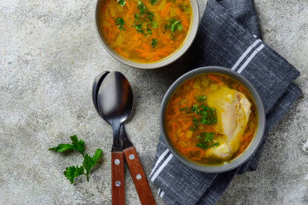 istock Chicken broth or soup with vegetable 1176845718