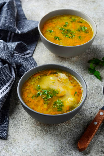 istock Chicken broth or soup with vegetable 1176845724