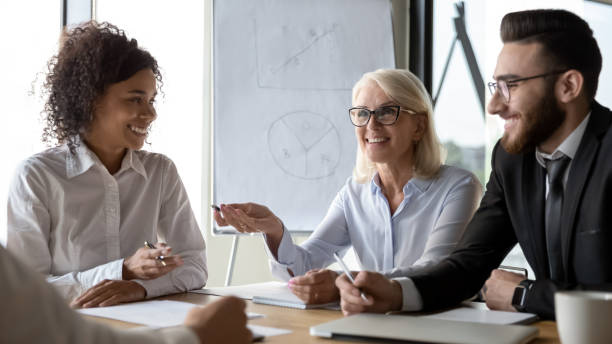 istock Diverse employees business partners discussing ideas at briefing 1176848628