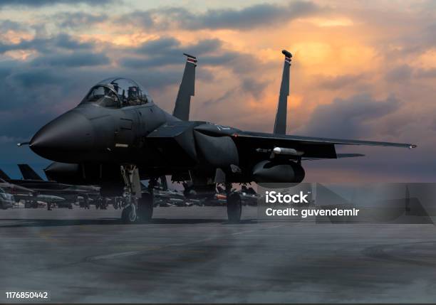F15 Eagle Fighter Plane At Sunset Stock Photo - Download Image Now - Fighter Plane, Military Airplane, US Military