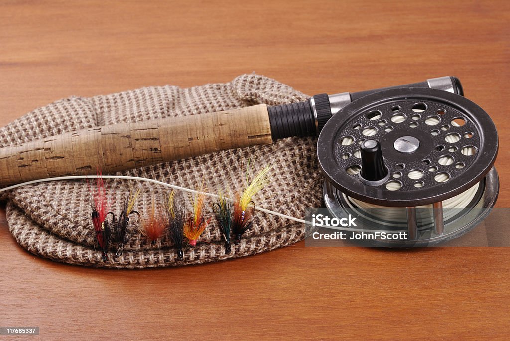 Fly Fishing Rod And Reel With A Tweed Flat Cap Stock Photo