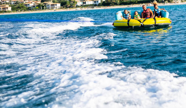istock Family having fun on water 1176853987