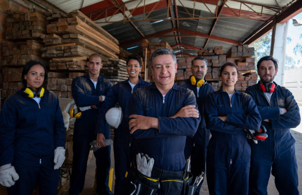 istock Group of workers working at a wood factory 1176856776