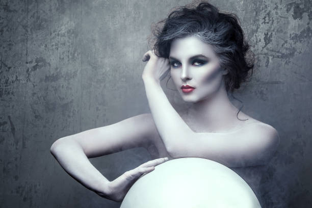 istock Woman with creative makeup and body-art 1176865857