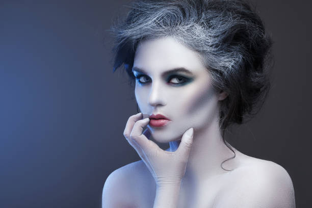 istock Woman with creative makeup and body-art 1176865912