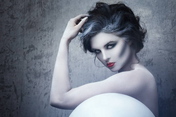 istock Woman with creative makeup and body-art 1176866010