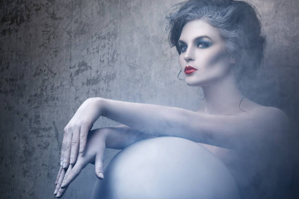 istock Woman with creative makeup and body-art 1176866099