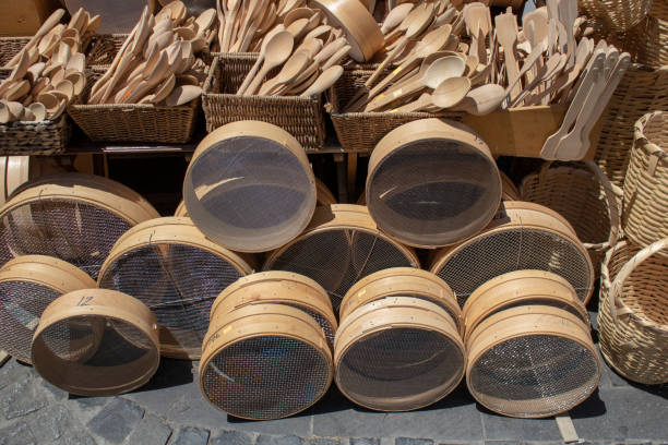 istock On the wooden counter there are kitchenware and sieves. 1176867299