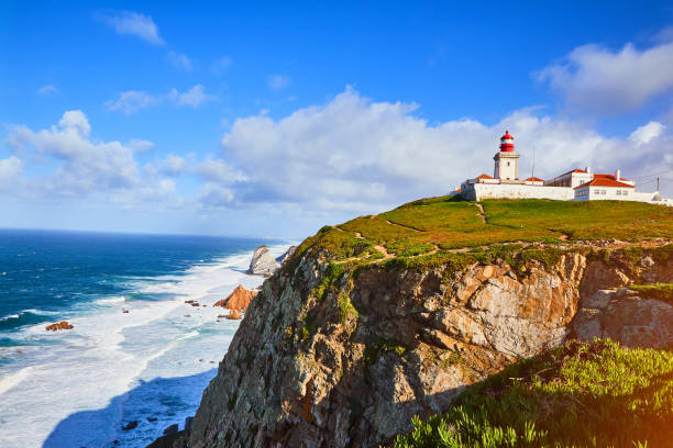 istock Cabo da Roca, Portugal. Lighthouse and cliffs over Atlantic Ocean, the most westerly point of the European mainland. 1176870069