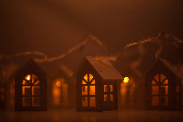 istock Glowing houses Christmas card 1176871056