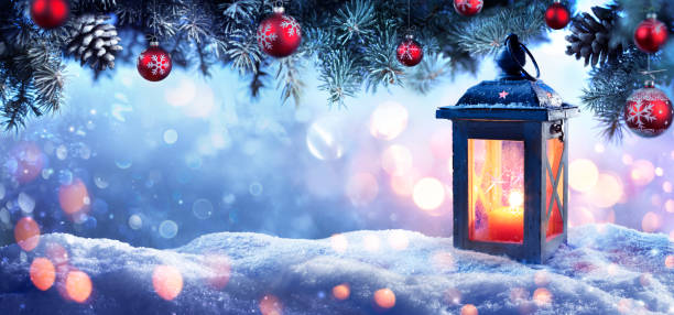 istock Christmas Lantern On Snow With Snowy Fir Branches And Baubles 1176872347