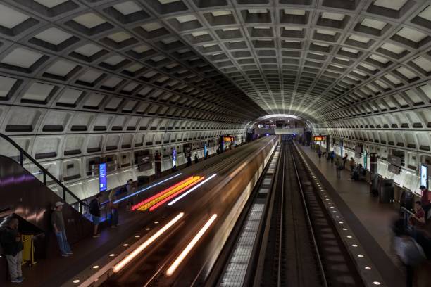 Light streaks from a subway train A subway train becomes streaks of light departing from the station subway photos stock pictures, royalty-free photos & images