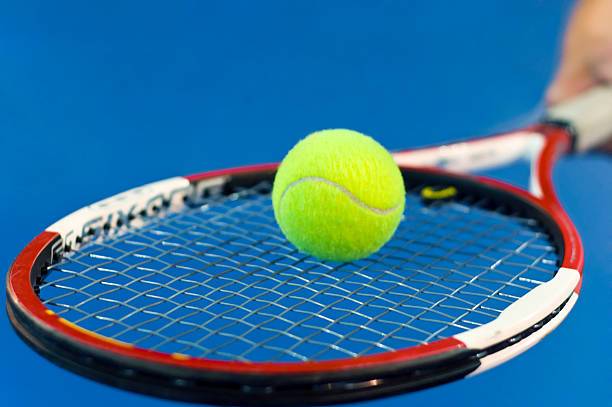 istock Tennis ball on the racket 117688603
