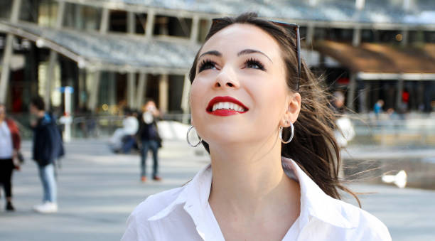 istock Woman walking in a modern city 1176887634