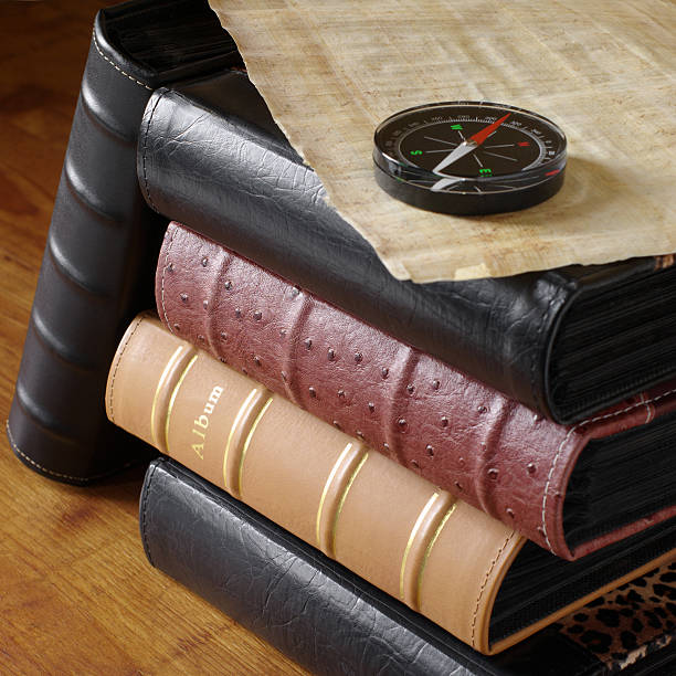 istock Photoalbums, parchment and compass 117688966
