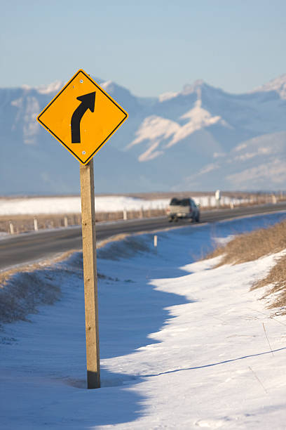 istock Curved Road to Rocky Mountains 117689120