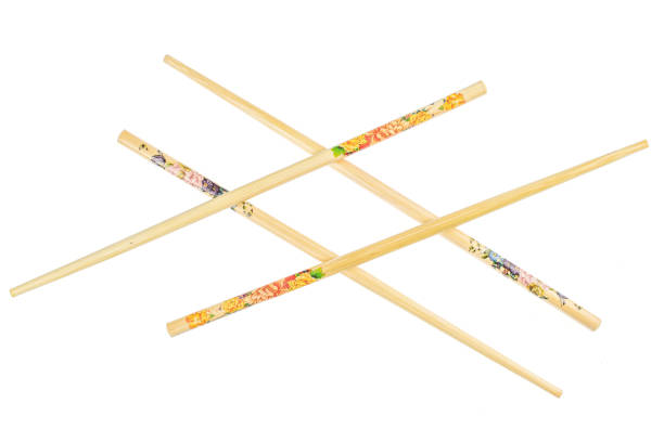 istock Asian chopsticks isolated on white 1176896026
