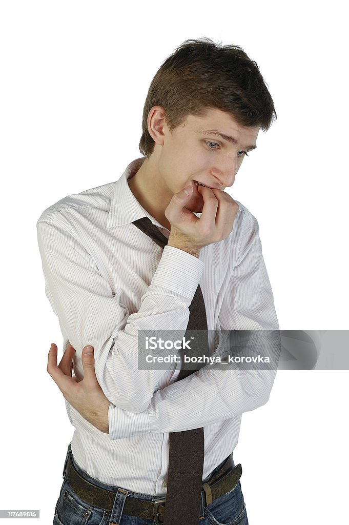 Dudoso hombre joven - Foto de stock de Adulto libre de derechos