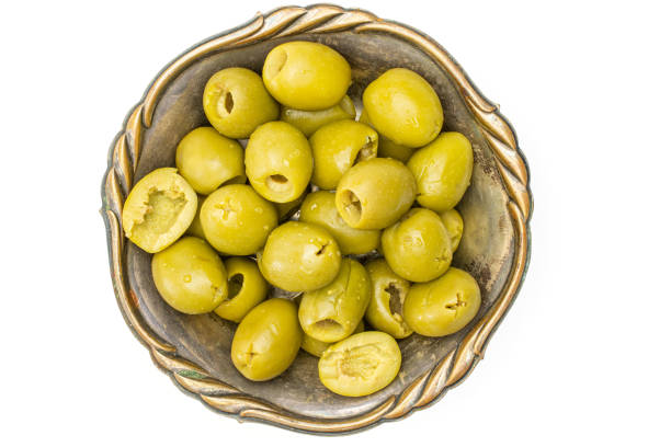 istock Pitted green olive isolated on white 1176898570