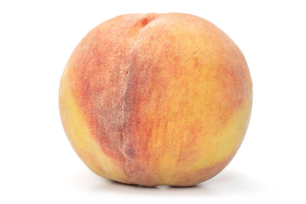 istock Fresh fuzzy peach isolated on white 1176899455