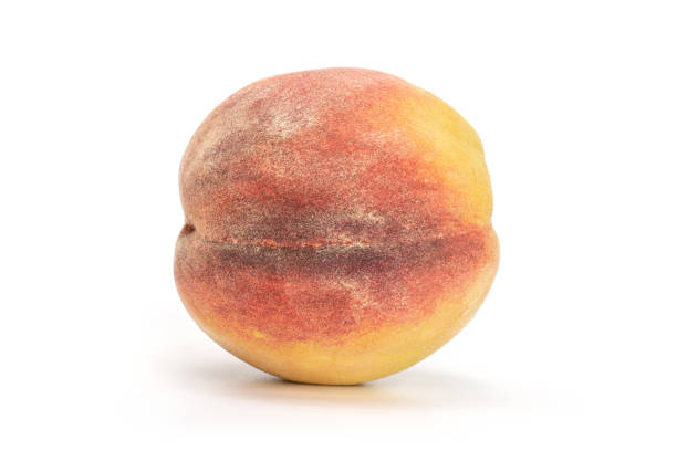 istock Fresh fuzzy peach isolated on white 1176899471