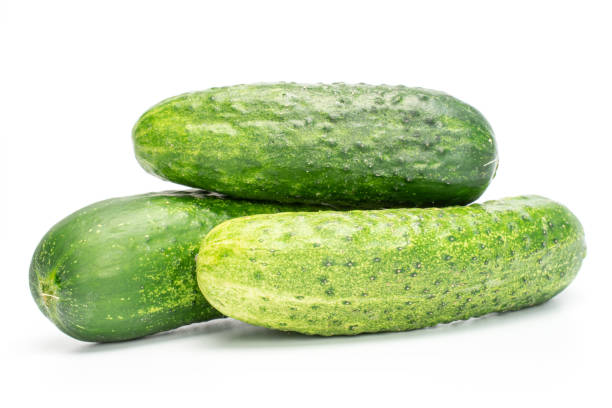 Fresh green cucumber isolated on white stock photo