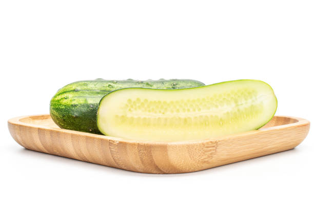 istock Fresh green cucumber isolated on white 1176899679