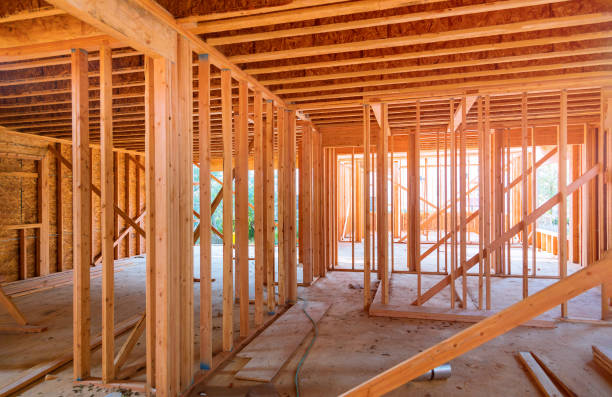 istock New construction of beam construction house framed the ground up 1176901930