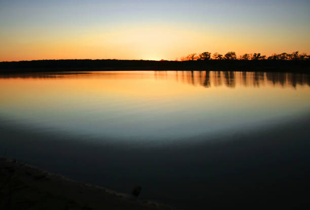 Sunset over a pond in Oklahoma USA