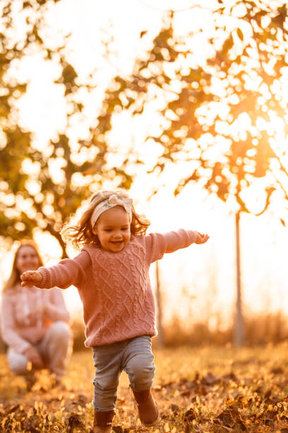 istock Enjoying warm autumn day at the park 1176906278