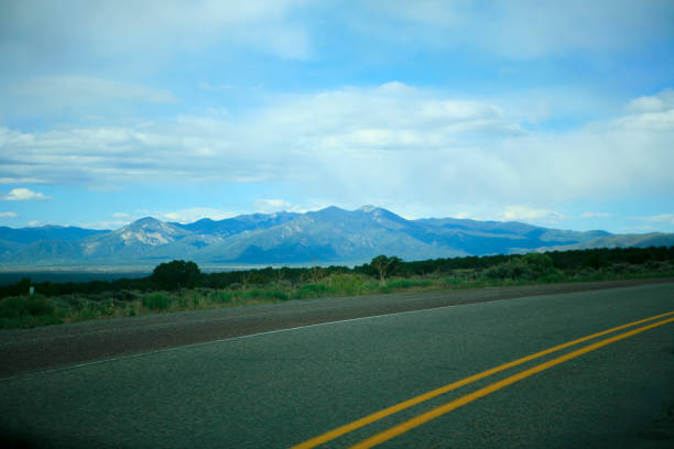 istock Mountain view from an empty highway near Taos New Mexico 1176913615