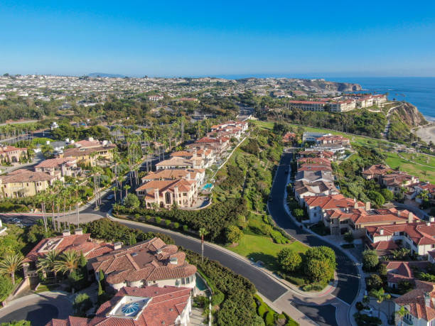 Aerial view of wealthy villa in small town Mornach Beach Aerial view of Salt Creek and Monarch beach coastline. Small neighborhood in Orange County City of Dana Point. California, USA. Aerial view of wealthy villa in small town laguna niguel stock pictures, royalty-free photos & images