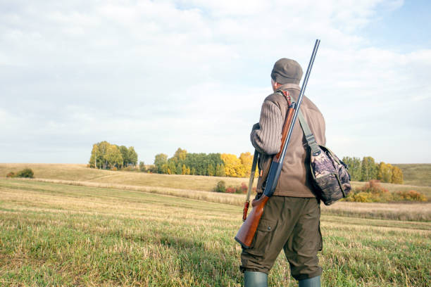 istock Man hunter outdoor in autumn hunting. 1176919939