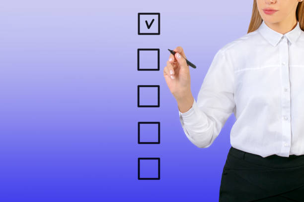 istock Business woman checking on checklist box. 1176920039