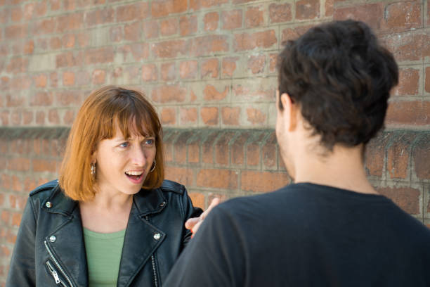 istock Young couple having argument and quarrelling with each other 1176921763