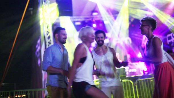 istock People dancing in front of stage 1176922808