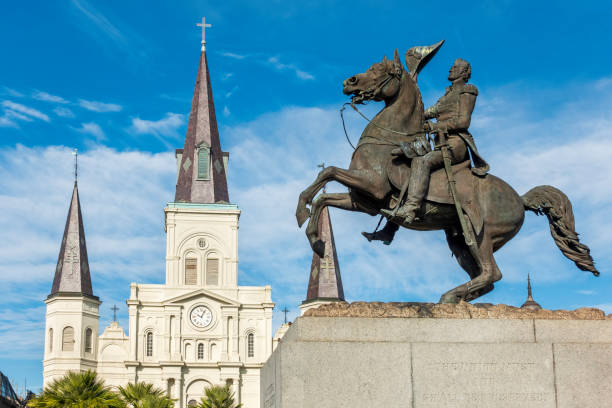 New Orleans, USA - Dec 17, 2017: Close-up view of the commemorative statue of General Andrew Jackson on horseback in Jackson Square. St. Louis Cathedral in the background.