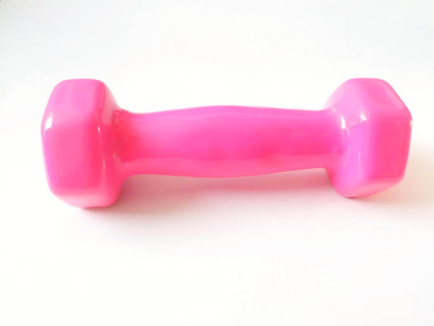 istock VH544 Pink dumbbell on white background 1176925701