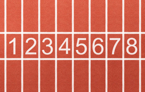 istock Athlete running track with number on the start . 1176927146