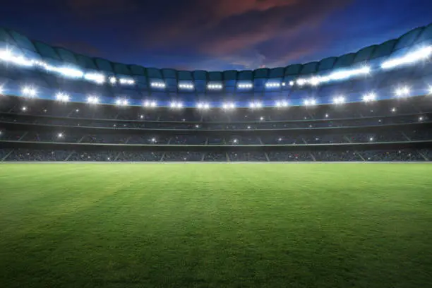 Stadium with spotlight and empty green grass. NIght scene .