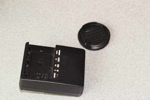 istock Battery charger with lens cap 1176931785