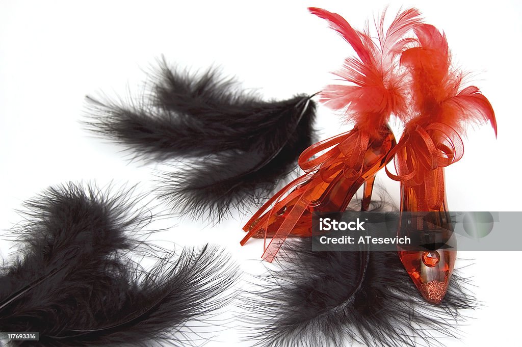 Two red crystal slippers with feathers  Beauty Stock Photo