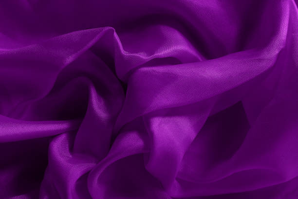 istock Dark purple fabric cloth texture for background and design art work, beautiful crumpled pattern of silk or linen. 1176933757